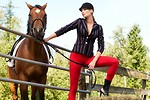 Free Stock Photo: A beautiful blonde posing on a fence with a horse