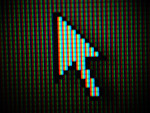 Free Stock Photo: Close-up of a mouse pointer on a computer screen