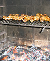 Free Stock Photo: Chicken roasting over a fire