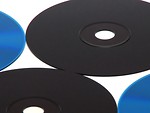 Free Stock Photo: Blue and black cds isolated on a white background.