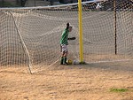 Free Stock Photo: Boy playing in a soccer goal net