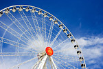 Free Stock Photo: A large ferris wheel with a blue sky background
