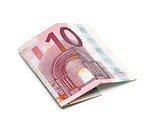 Free Stock Photo: A ten Euro note folded on a white background