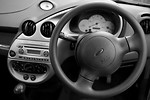 Free Stock Photo: A car dashboard with steering wheel