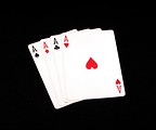 Free Stock Photo: Four aces isolated on a black background.