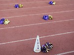 Free Stock Photo: Pom poms and a megaphone on a track field
