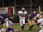 Free Stock Photo: High school football players on a football field