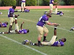 Free Stock Photo: High school football players exercising before a game