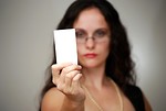 Free Stock Photo: A beautiful business woman holding a blank business card