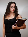 Free Stock Photo: A beautiful business woman holding folders