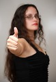 Free Stock Photo: A beautiful business woman giving a thumbs up