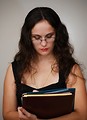Free Stock Photo: A beautiful business woman holding folders