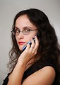 Free Stock Photo: A beautiful business woman talking on a cell phone