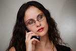 Free Stock Photo: A beautiful business woman talking on a cell phone.