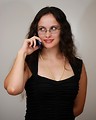 Free Stock Photo: A beautiful business woman talking on a cell phone