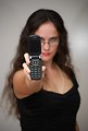 Free Stock Photo: A beautiful business woman showing a cell phone