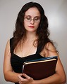 Free Stock Photo: A beautiful business woman holding folders